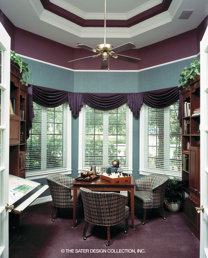 The study has detailed ceilings and large windows