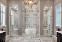 Waters Edge House Plan&#39;s his-and-hers walk-in showers and soaking tub