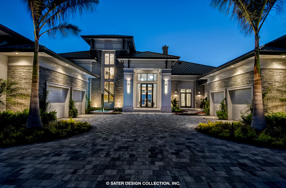 Waters Edge House Plan photo of the front of the home at night